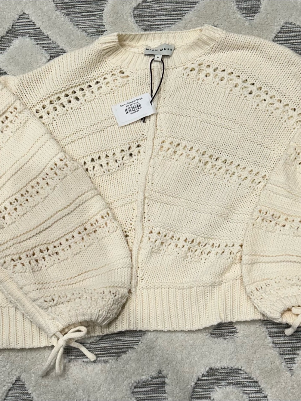 Open-Knit Cream Cardigan with Drawstring Cuffs